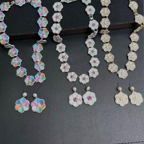 Luxurious, heavy, exaggerated, rich man's party, ball performance, diamond-encrusted, fancy earrings, party dress, elegant suit matching